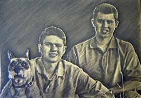 Bronze Picture of 2 young men with their dog