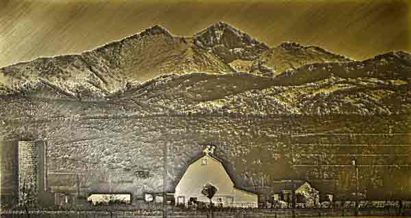 Bronze Picture of a farm with the Rocky Mountains in the background