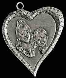 Silver Jewelry Pendant with a heart frame
